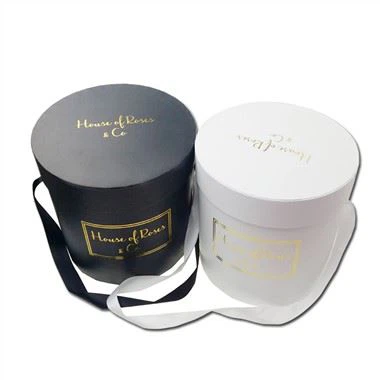 Apaļas ziedu kastes kā dāvanu komplekti